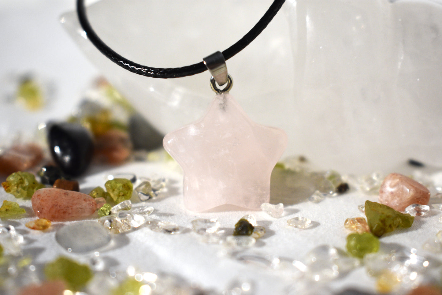 Rose quartz star on cord necklace