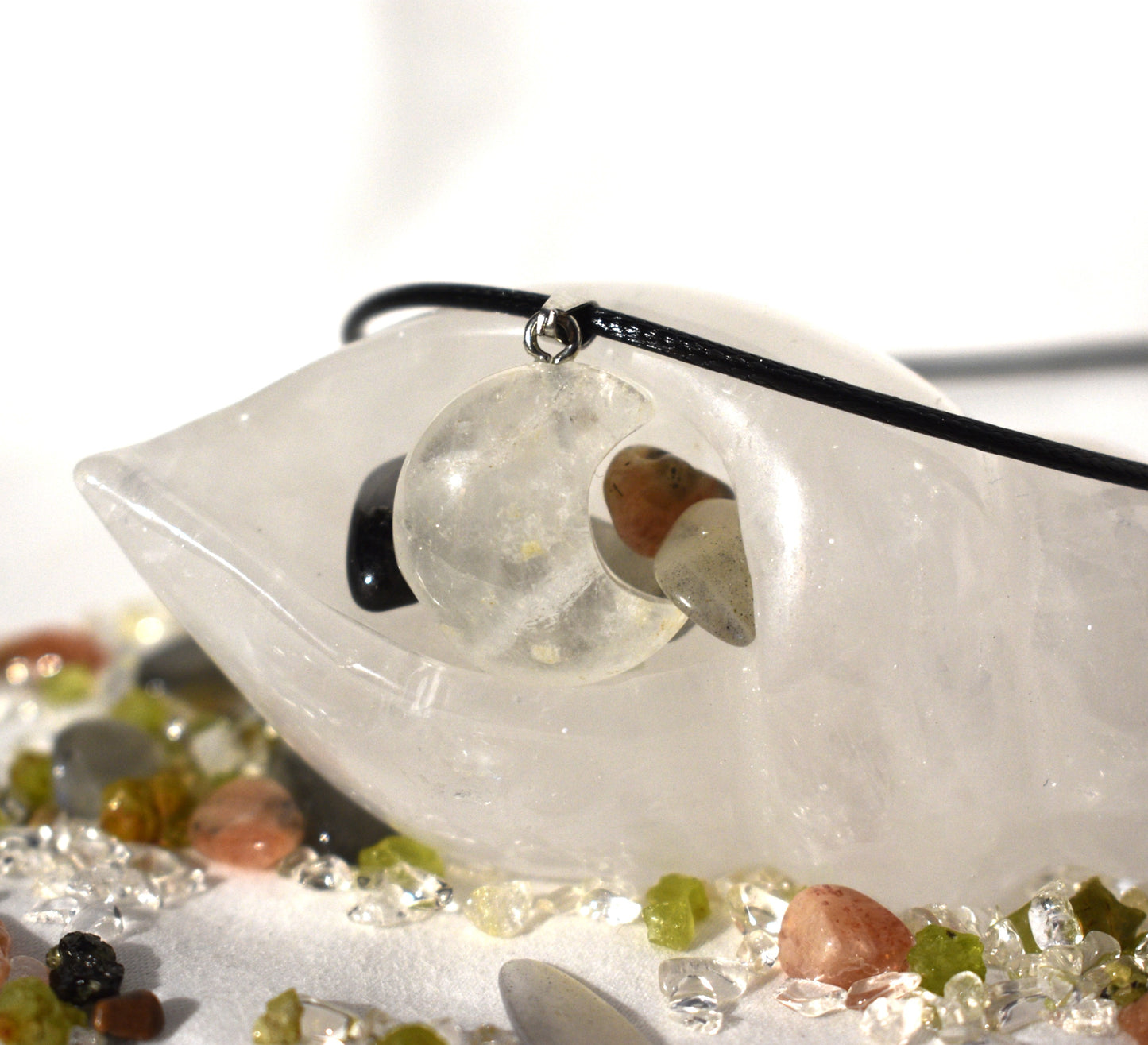 Clear quartz moon on cord necklace