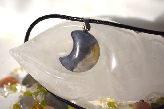 Fluorite moon on cord necklace